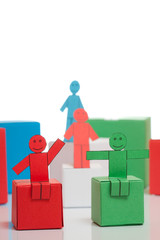 Toy men sitting on boxes