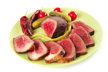 red beef slices on green dish