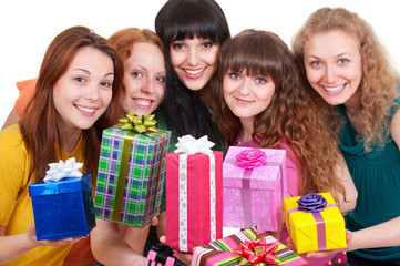smiley women with motley gift boxes