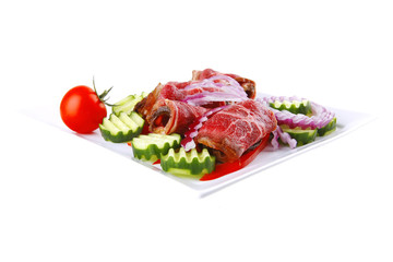 served beef rolls on white