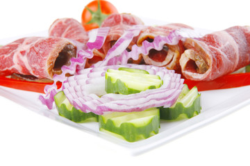 meat rolls on white