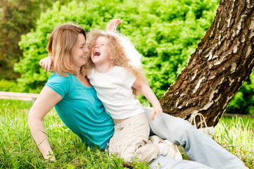 mother playing with her daughter