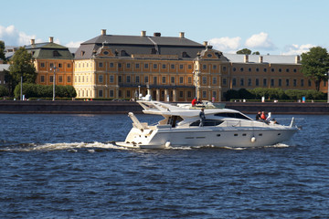 Motoryacht on the background of The Menshikov Palace