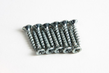 Row of metal screws
