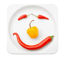 Chili peppers smile. Isolated on white