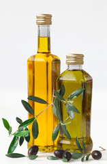Olives and bottle with olive oil
