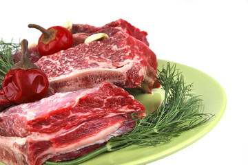 rib's on dish with greenery