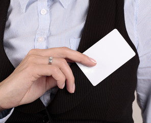 Obraz premium Blank Business Card in Business Woman Hands