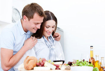 Obraz na płótnie Canvas Portrait of Cute couple preparing a meal