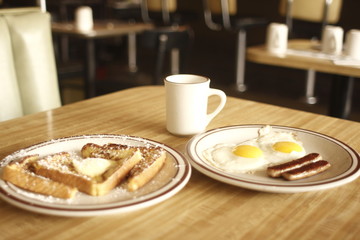 breakfast of eggs and sausage links