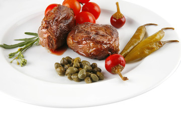 meat medallion with cherry tomatoes