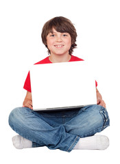 Adorable little boy sitting with laptop