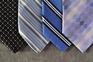 Four blue ties in exhibition