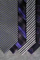 Black, silver and dark blue ties in exhibition