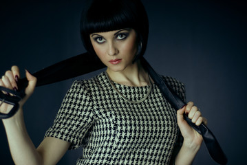 Girl in checked dress studio