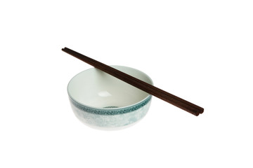 Isolated picture of chopsticks on a bowl