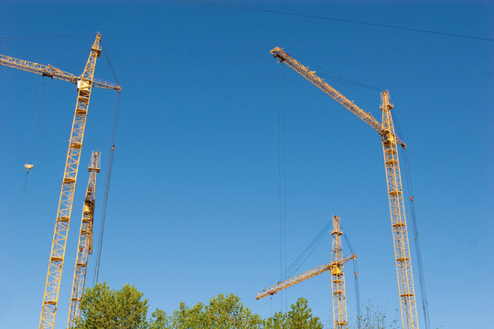 four hoisting cranes