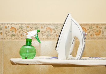 Steam iron and spray on board