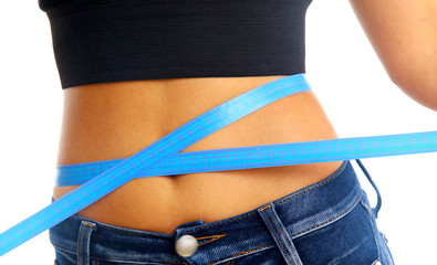 Measure tape around slim beautiful waist.