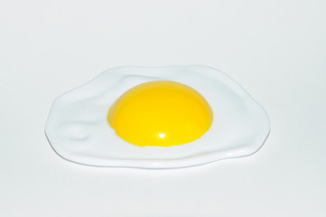 Egg on white background  (plastic)
