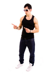 stylished young man full body wearing sunglasses on white backgr