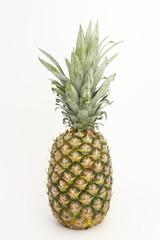 Fototapeta premium Pineapple with leaves on a white background