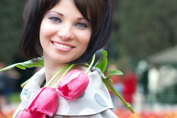 Pretty girl with tulips