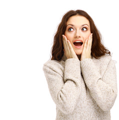 Closeup of a happy young woman surprised