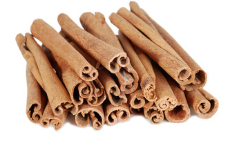 isolated cinnamon sticks