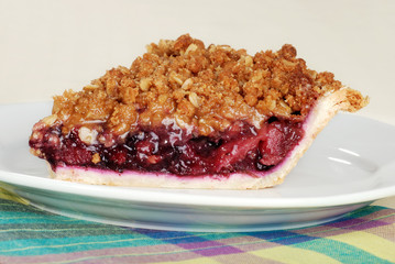 side view mixed fruit crumble pie