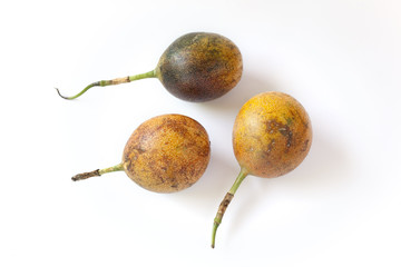 Three whole passionfruits