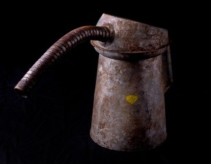 Antique oil can