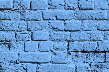 the blue painted brick wall