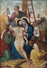Jesus' body is removed from the cross