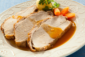 Roasted loin slices with vegetables