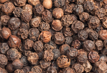 A macro of black pepper seeds