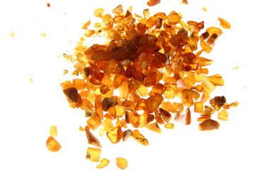 Stones of amber on white background