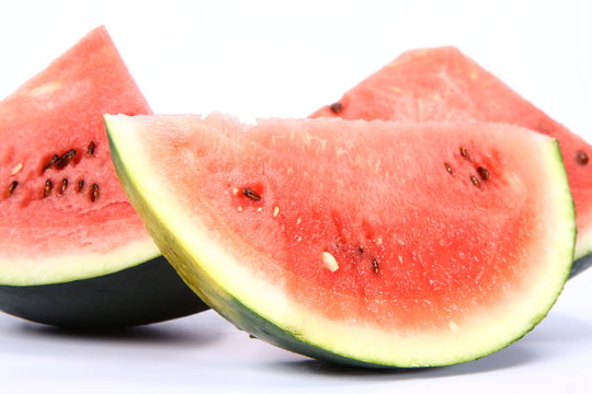 Pieces of watermelon on white background
