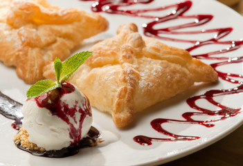 Dessert ice-cream with mint and roll leaves