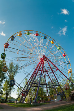 Merry go round wheel in park amusement