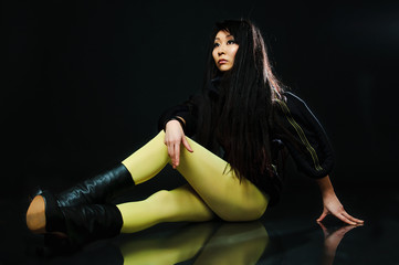 Obraz na płótnie Canvas sitting brunette asian model