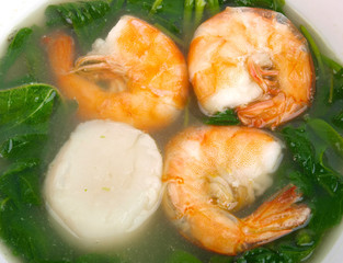 Chinese shrimp soup. Close up. White background