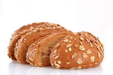 Bread with sunflower seeds isolated on white