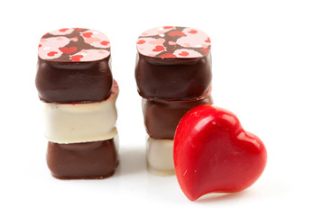 pile of bonbons over white background