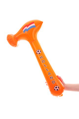 Hand with blown up orange hammer over white background