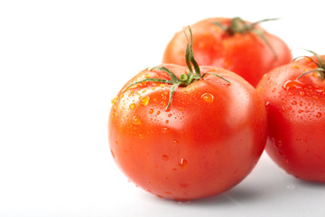 fresh tomatoes on the white background