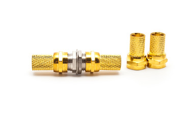 gilded television connectors on a white background