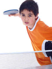 young boy playing table tennis isolated on white background