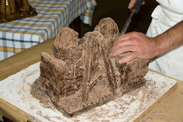 Chocolate sculptor hands in action
