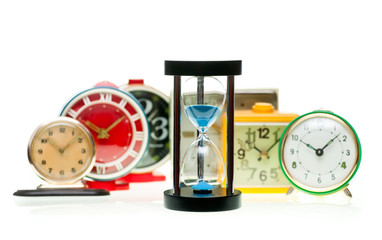 Hourglass and alarm clocks